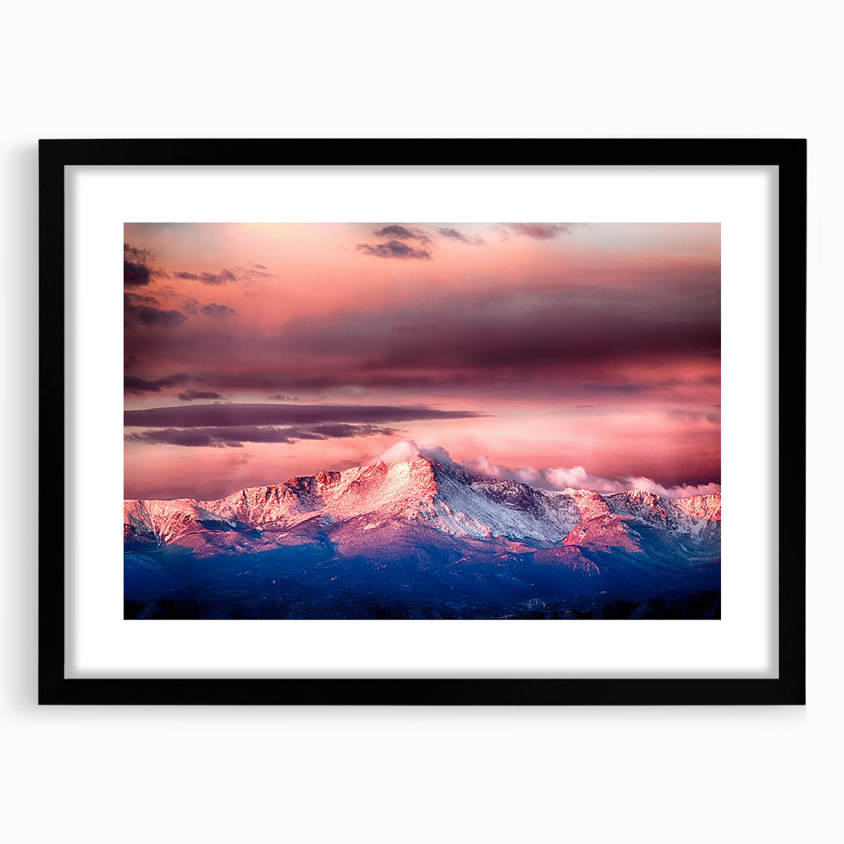 Colorful art print of Pikes Peak with abstract textures in vibrant hues on a large framed canvas.