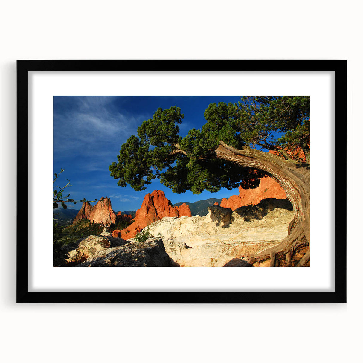 Extra large abstract art print of Colorado Springs with vibrant colors and textured look on a black framed canvas.