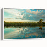 Vintage poster art of the Everglades in vibrant colors on a framed canvas, ideal for living room decor.