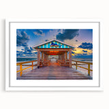 Abstract art print depicting Fort Lauderdale in vibrant hues on a framed white mat, ideal for dining room decor.