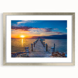 Textured art depicting an abstract rendition of the Florida Keys in cool blue and green tones, framed in silver.