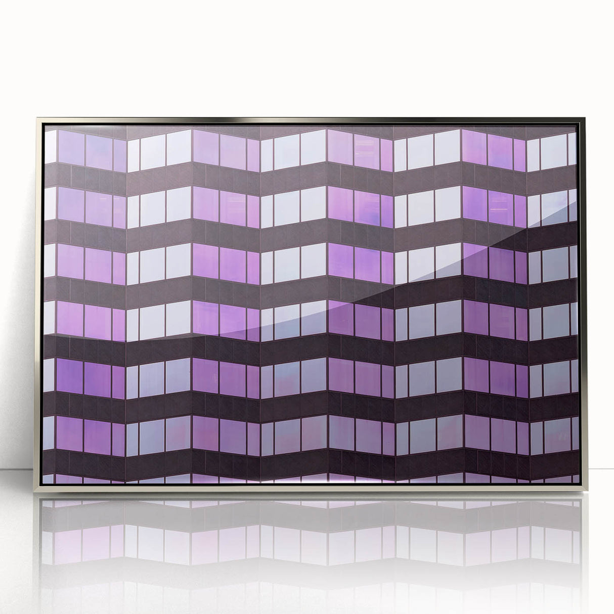 Mid-century modernist art of Tampa skyline in silver acrylic frame, featuring cool blue and gray tones.