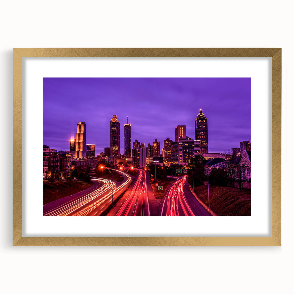 Extra large wall art featuring an abstract depiction of the Atlanta skyline in muted gold and gray tones on a framed canvas.