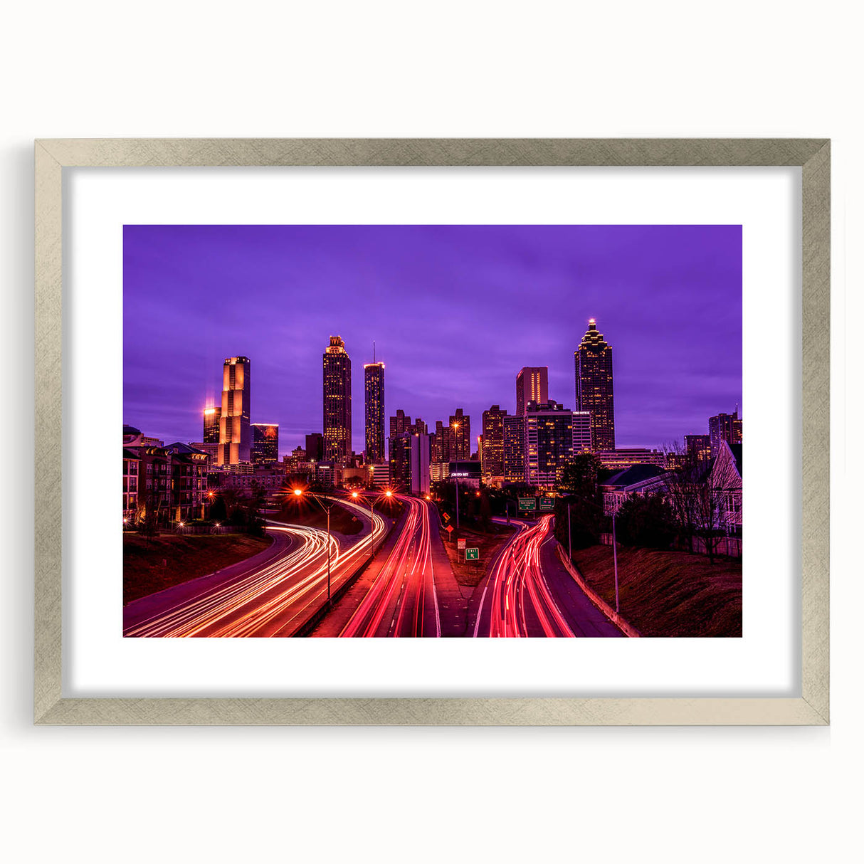 Textured abstract art print of Atlanta skyline in muted gray and blue tones, framed in silver.
