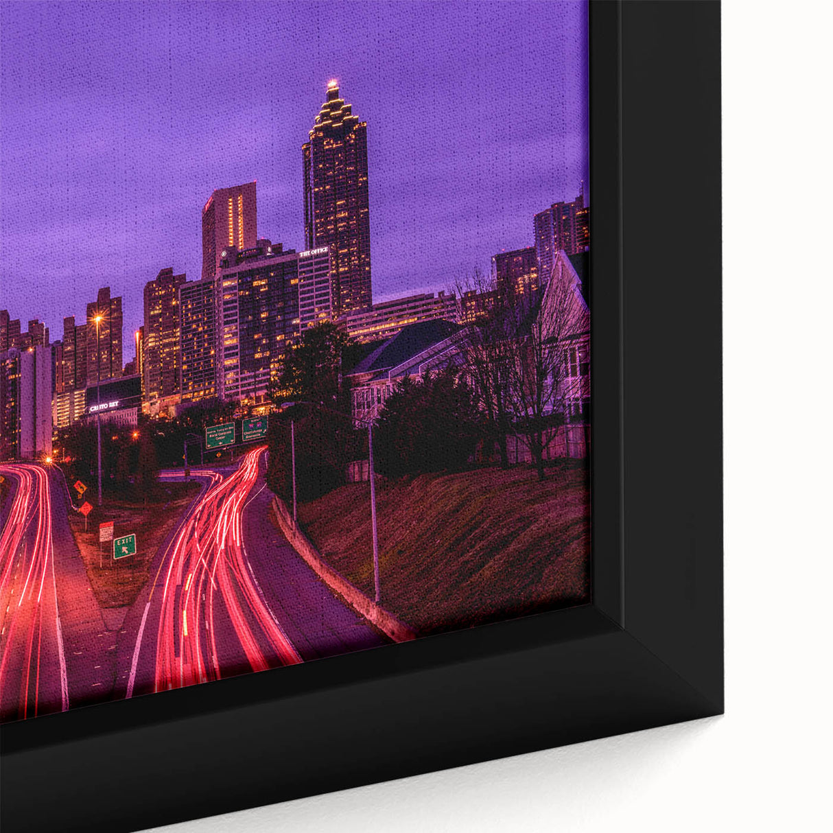 Textured black wall art of Atlanta skyline with colorful accents on a large framed canvas, ideal for living room decor.