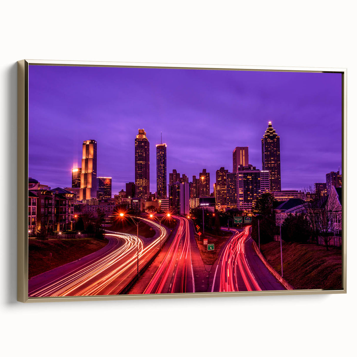 Framed canvas wall art featuring a vintage-style Atlanta skyline in muted gold and black tones, ideal for bedroom decor.