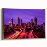 Framed canvas wall art featuring a vintage-style Atlanta skyline in muted gold and black tones, ideal for bedroom decor.
