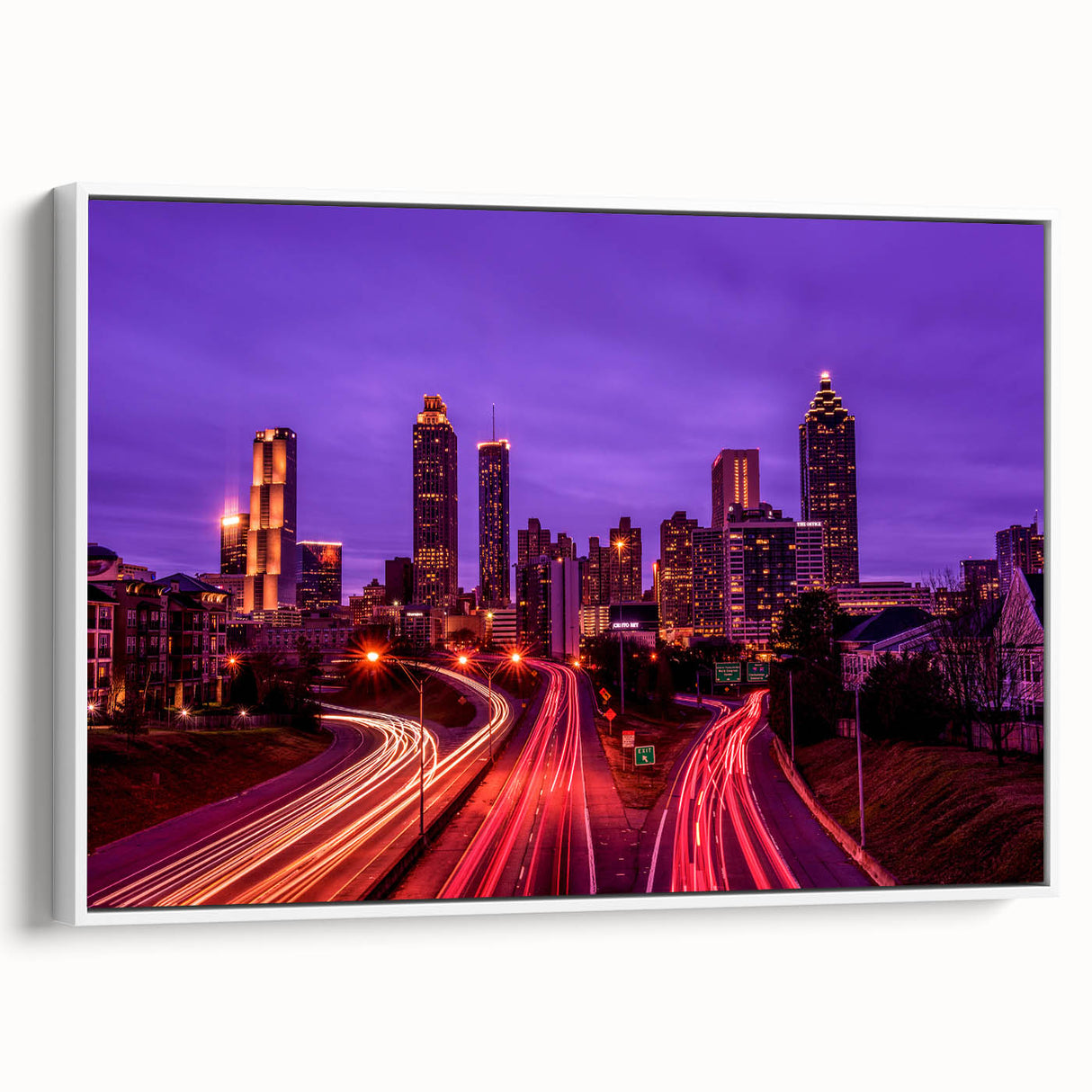 Vintage poster art of Atlanta skyline in colorful hues on a large framed canvas, ideal for living room decor.