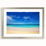 Textured abstract art print of Oahu scenery in muted blue and green tones, framed in silver, ideal for bedroom wall decor.