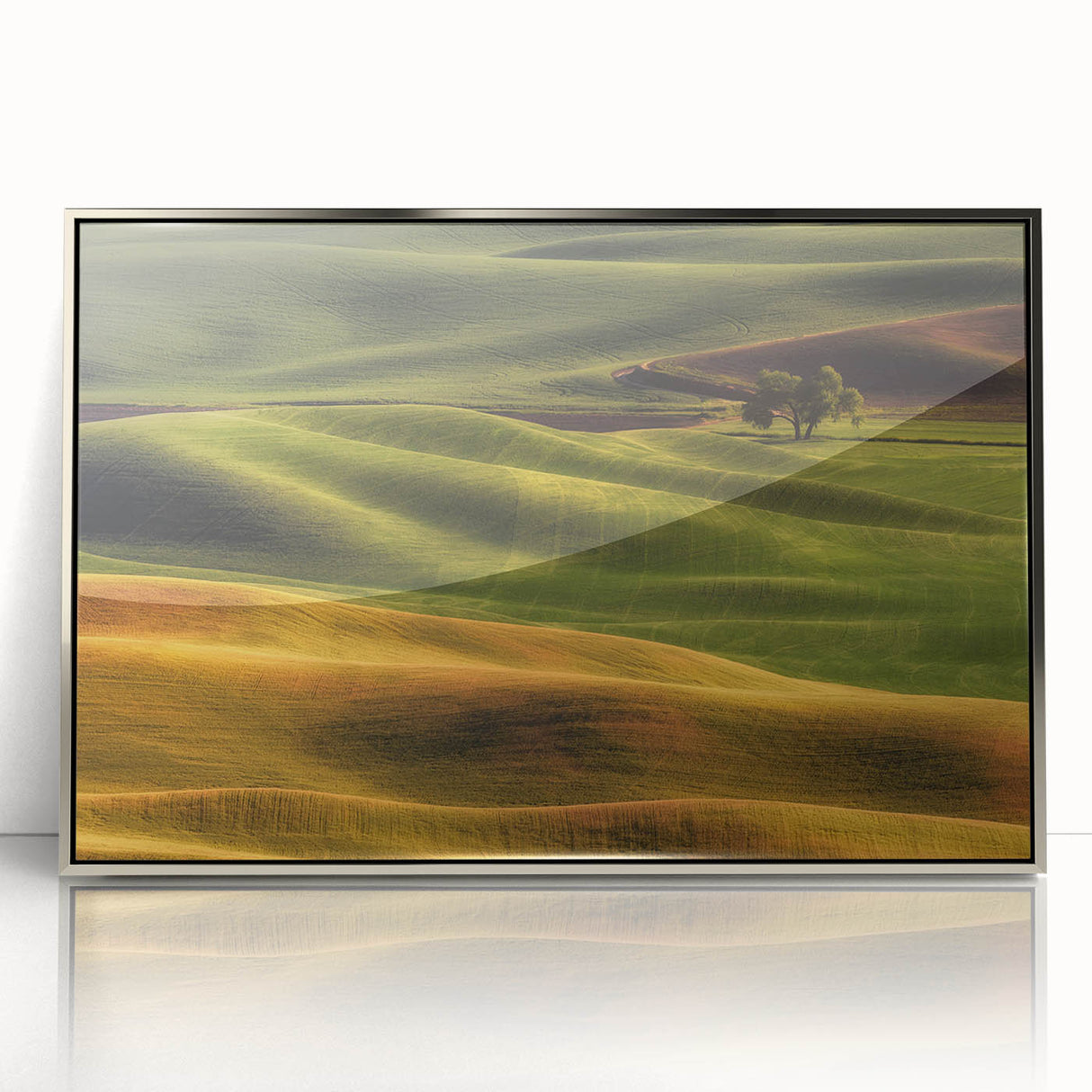 Mid-century modernist art depicting Idaho scenery in muted blues and greens on a framed acrylic print.