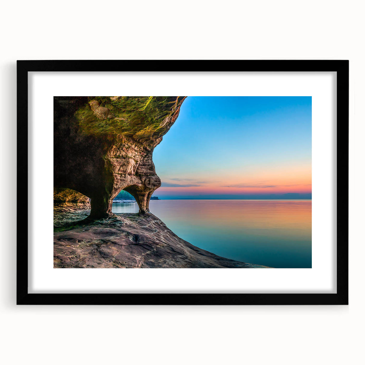 Colorful abstract art print of Lake Michigan, in a black frame with mat, perfect for living room decor.