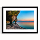 Colorful abstract art print of Lake Michigan, in a black frame with mat, perfect for living room decor.