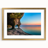 Extra large abstract art print of Lake Michigan, featuring textured blue and gray hues on a gold-framed canvas.