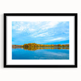 Abstract art print featuring vibrant, colorful swirls on a textured canvas, framed in black, ideal for living room decor.