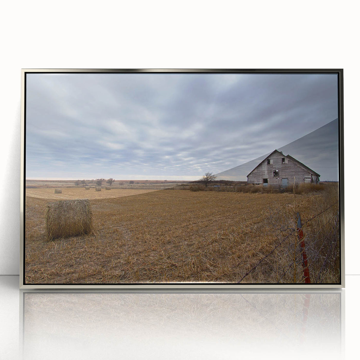 Mid-century modernist art depicting Iowa scenery in muted earth tones on a silver-framed acrylic print.