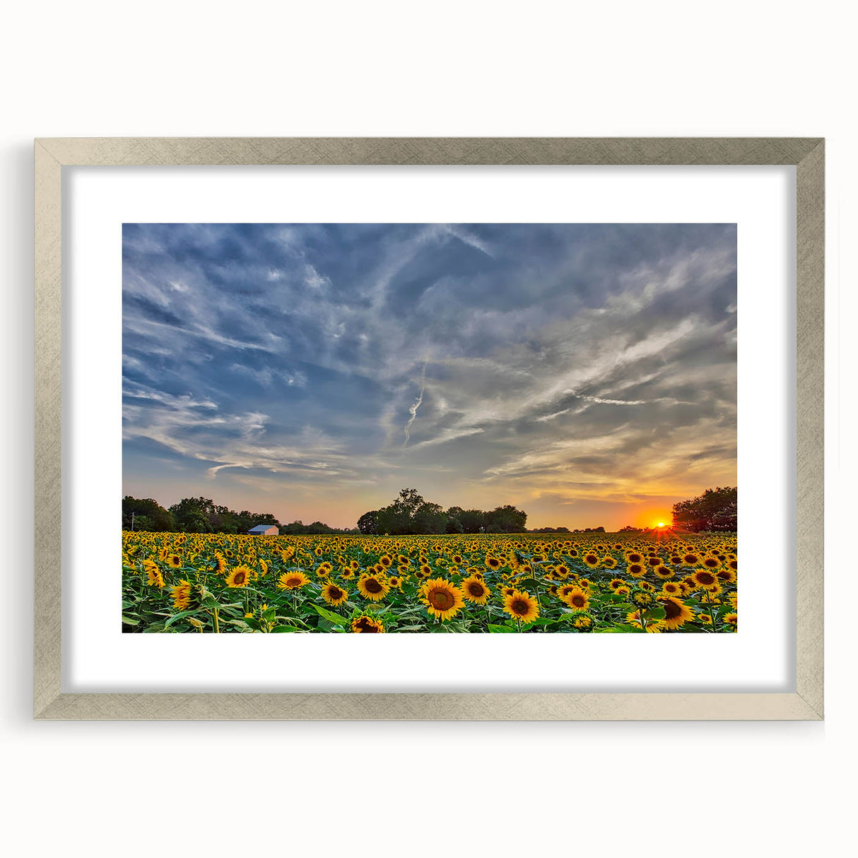 Textured abstract art print featuring muted earth tones in a silver frame, ideal for bedroom wall decor.