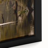 Close-up of textured black wall art depicting a colorful Louisiana landscape on a framed canvas, ideal for living room decor.