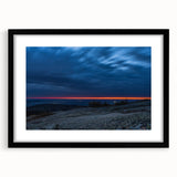 Colorful abstract art print of Acadia, featuring vibrant, textured hues, in a large black framed format.