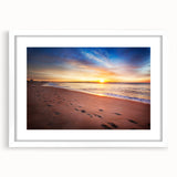 Abstract art print of Maine scenery in muted blue and green tones on a framed white mat.