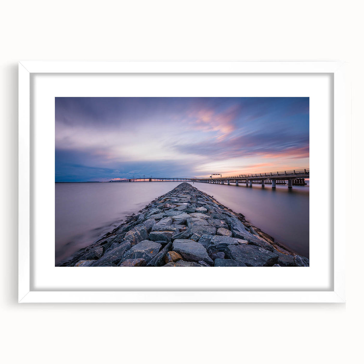 Abstract art print of Annapolis scenery in muted blue and gray tones on a white-framed mat, ideal for dining room decor.