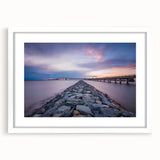 Abstract art print of Annapolis scenery in muted blue and gray tones on a white-framed mat, ideal for dining room decor.