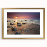 Colorful abstract art print of Michigan's Upper Peninsula in vibrant hues on a large textured canvas, framed in gold.