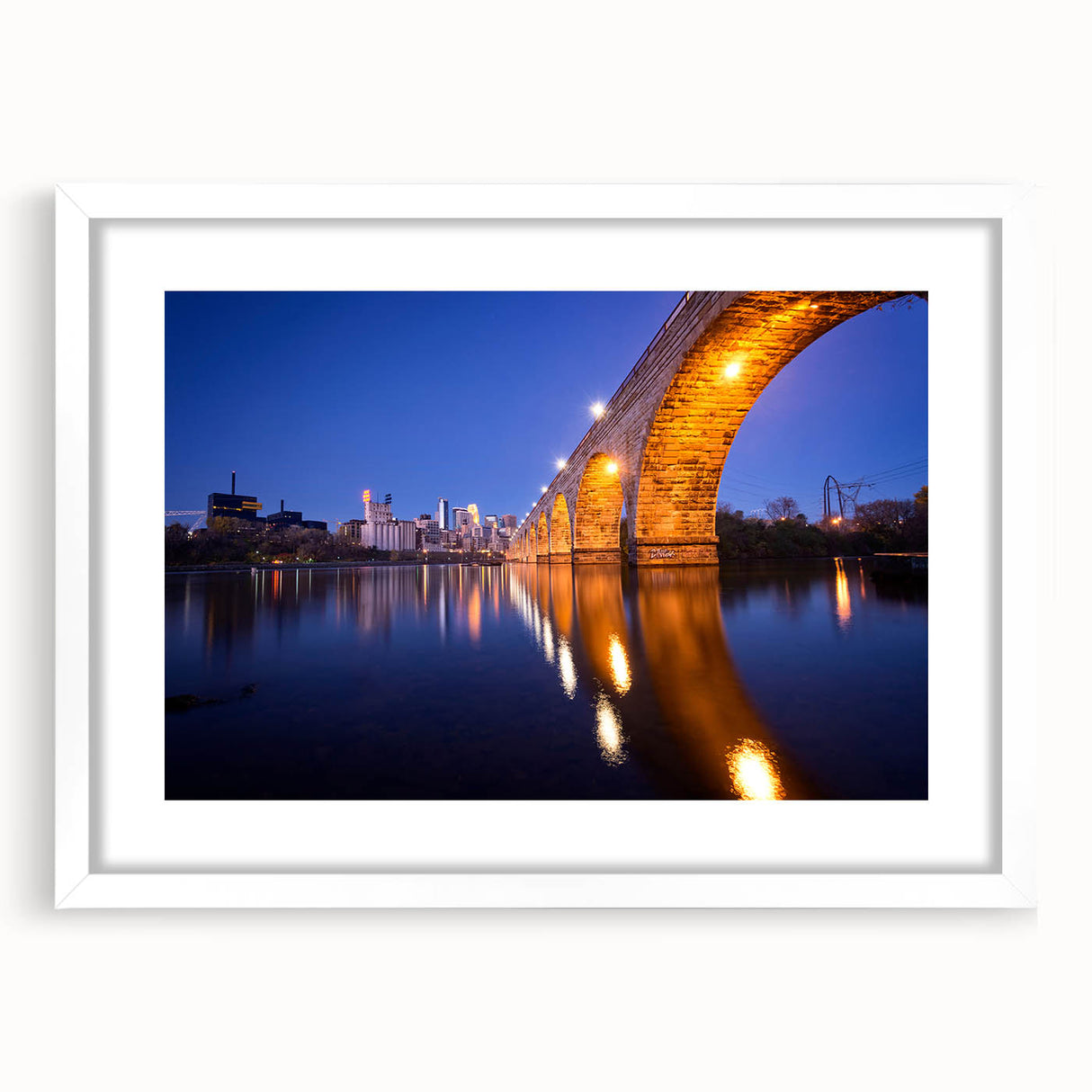 Extra large abstract art print of Minneapolis skyline in muted blue tones on a framed canvas, ideal for living room decor.