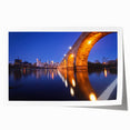 Rolled print of Minneapolis skyline in muted blue and gray tones, suitable for dining room wall art.