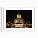 Abstract art print of Kansas City skyline in muted gray and blue tones on a white framed poster.