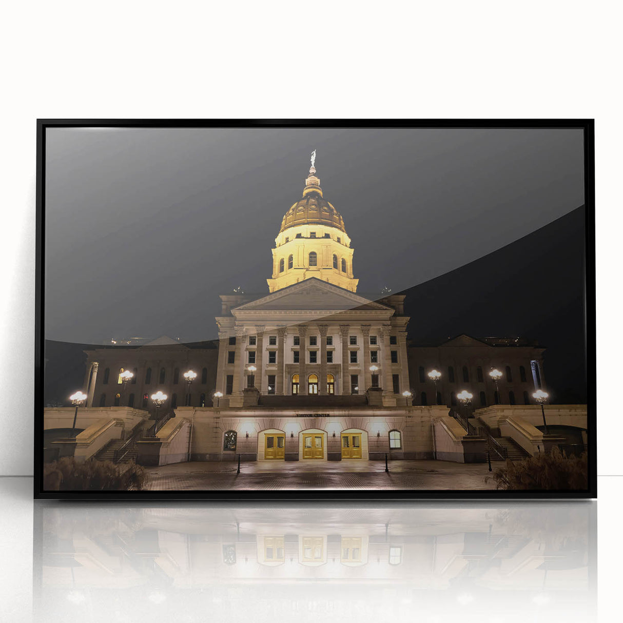 Large abstract wall art depicting the Kansas City skyline in muted gray and blue tones on framed acrylic.