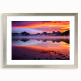 Textured abstract art print depicting a serene Montana landscape in muted earth tones, framed in silver.