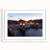 Abstract art print of Hoover Dam in muted blue and gray tones, framed with a white mat, suitable for dining room decor.