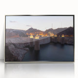 Mid-century modernist art depicting Hoover Dam in muted earth tones on a silver-framed acrylic print.