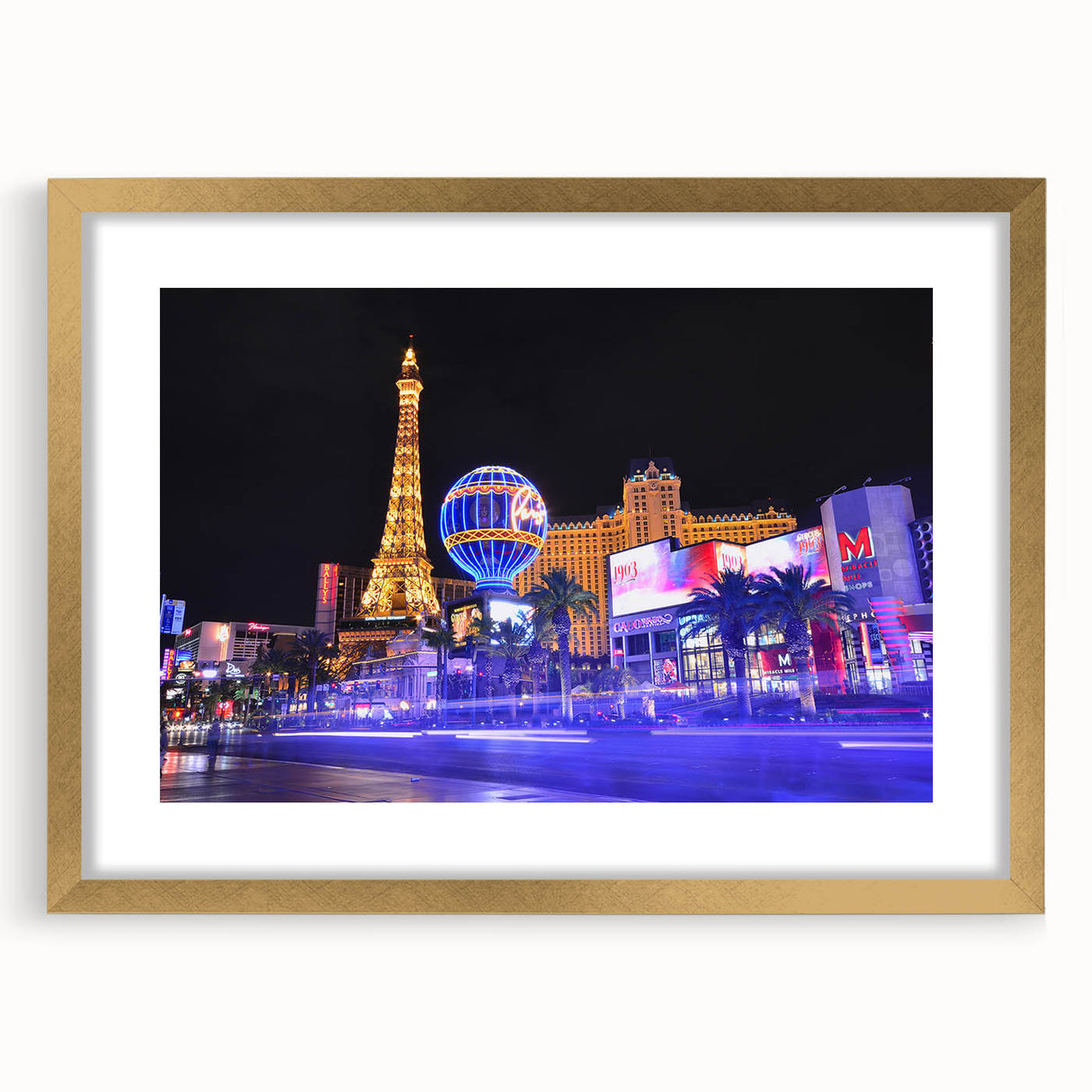 Extra large abstract art print of Las Vegas skyline in textured gold frame, suitable for living room decor.