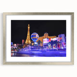 Textured art print depicting abstract Las Vegas skyline in muted silver and gray tones, framed with a silver mat.