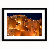 Colorful abstract art print depicting a textured New Mexico scenery in a large black frame, ideal for living room decor.