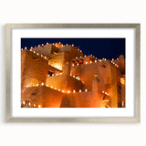 Textured abstract art print depicting the New Mexico landscape in earthy tones, framed in silver, ideal for bedroom art.