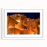 Abstract art print of New Mexico scenery in muted earth tones on a white framed canvas, suitable for dining room decor.