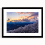 Abstract art print of Blue Ridge in vibrant colors, textured surface, framed in black, ideal for living room decor.