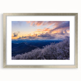 Textured art depicting abstract Blue Ridge Mountains in cool blue tones, framed with a silver mat, ideal for bedroom art.