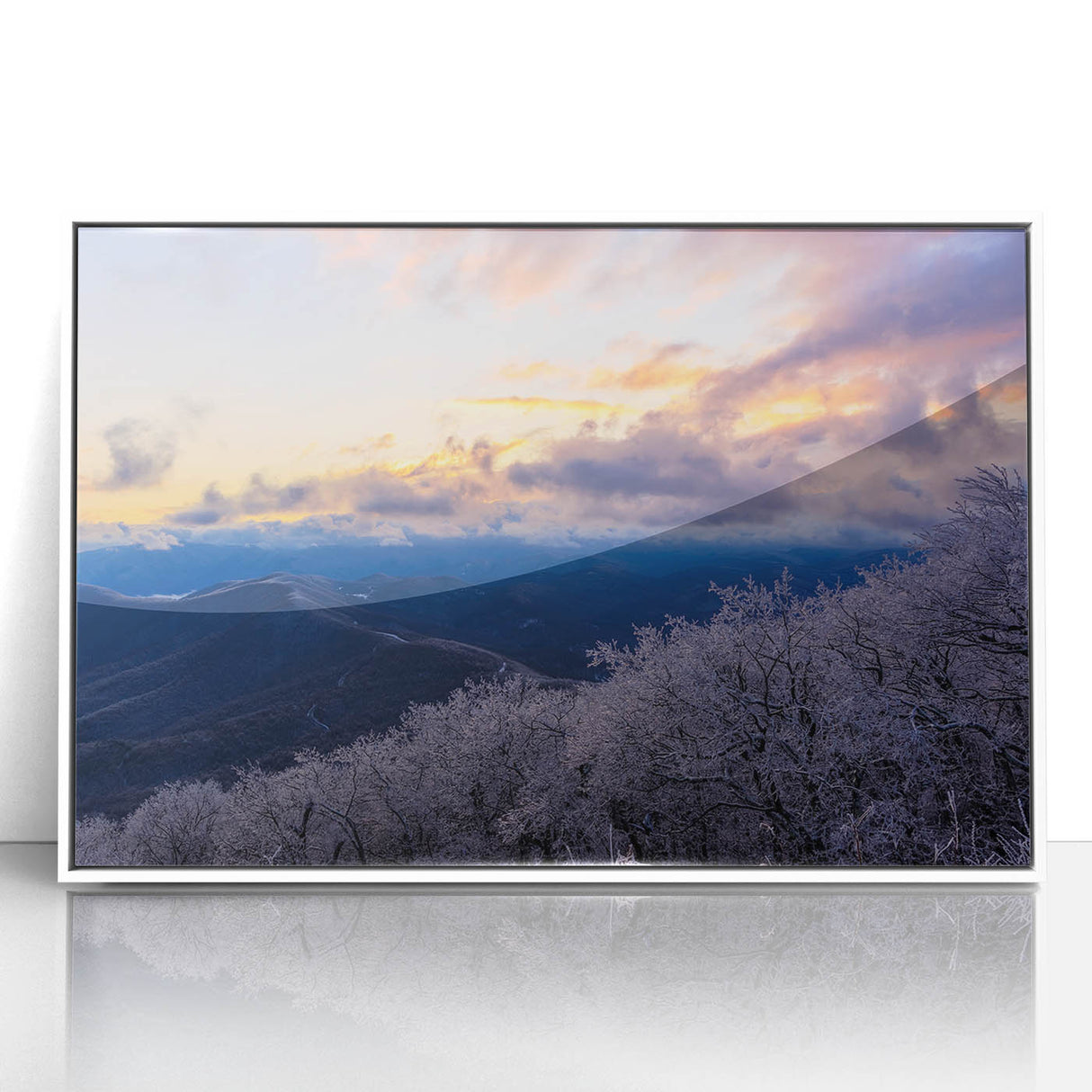 Acrylic print of the Blue Ridge Mountains in muted blue and green tones, framed in white, suitable for nursery wall decor.
