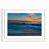Abstract art print of Cape Hatteras with muted blues and greens on a white framed canvas, suitable for dining room decor.