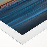 Art deco poster of Cape Hatteras, featuring muted blue and beige tones on rolled canvas, suitable for dining room decor.