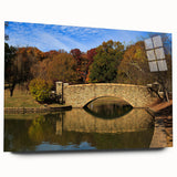 Acrylic print of a large abstract depiction of Charlotte's skyline in muted blue and gray tones.