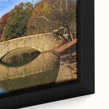 Framed canvas featuring a textured depiction of the Charlotte skyline in black with colorful accents.