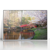 Art deco poster of Durham, North Carolina skyline in muted gray and blue tones on a white framed acrylic.