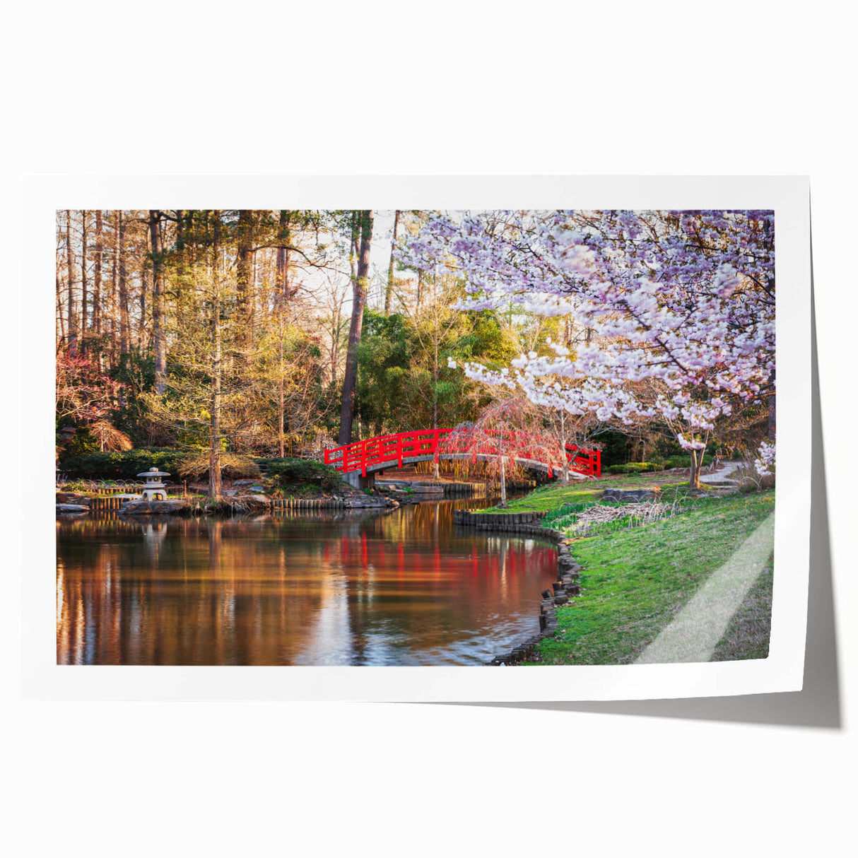 Rolled print of Durham, North Carolina scenery with floral elements in muted green and blue tones.