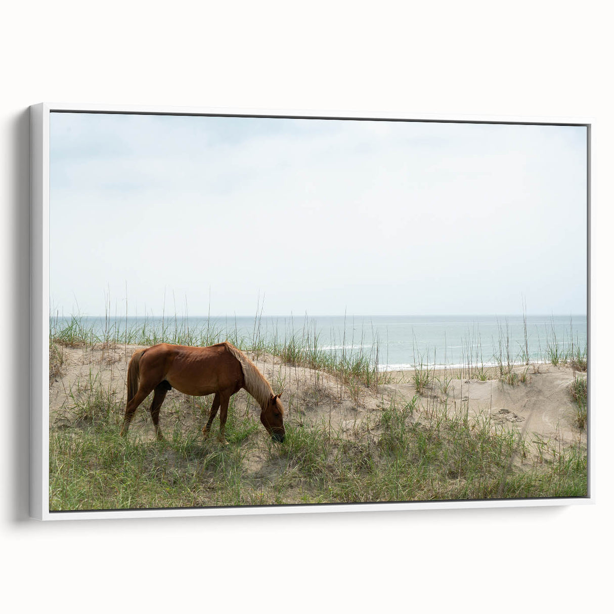 Vintage poster art of the Outer Banks in vibrant colors on a large framed canvas, ideal for living room decor.