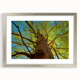 Textured abstract art print of Raleigh, North Carolina, in muted blues and grays on a framed silver canvas.