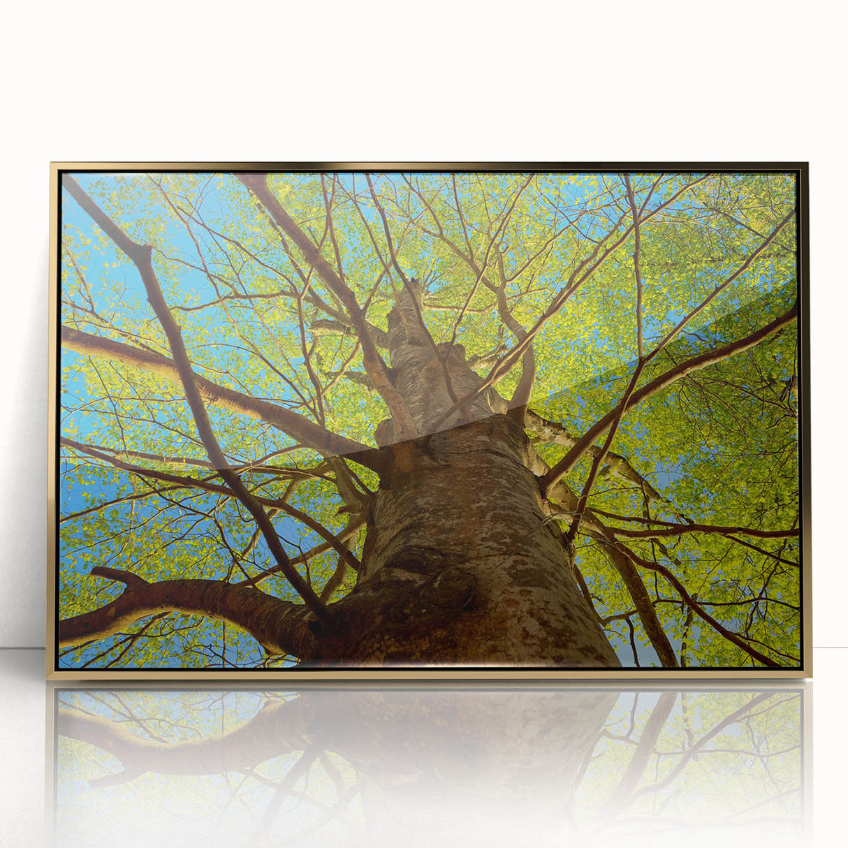 Mid-century modernist art of Raleigh, North Carolina skyline in gold and blue hues on framed acrylic.